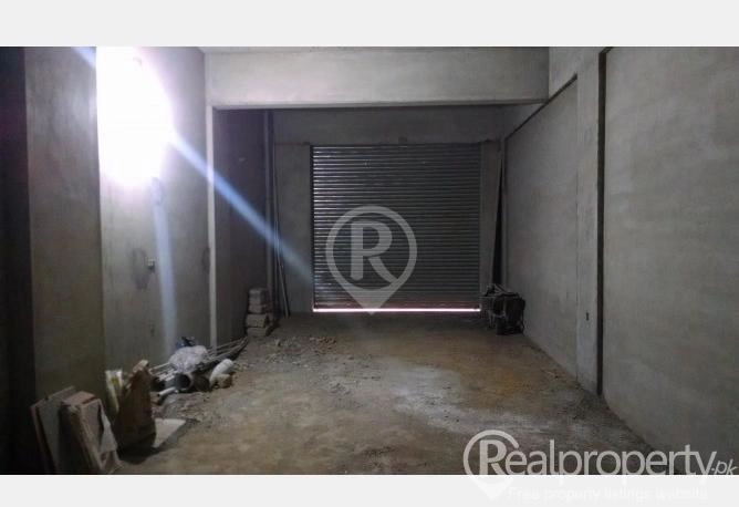 150 feet wide Main road facing of gulistan e jauhar block 9  two shops size 15/42 with 2 bathrooms