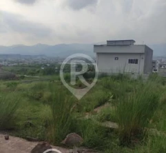 18 Marla Prime location Concrete Road Plot